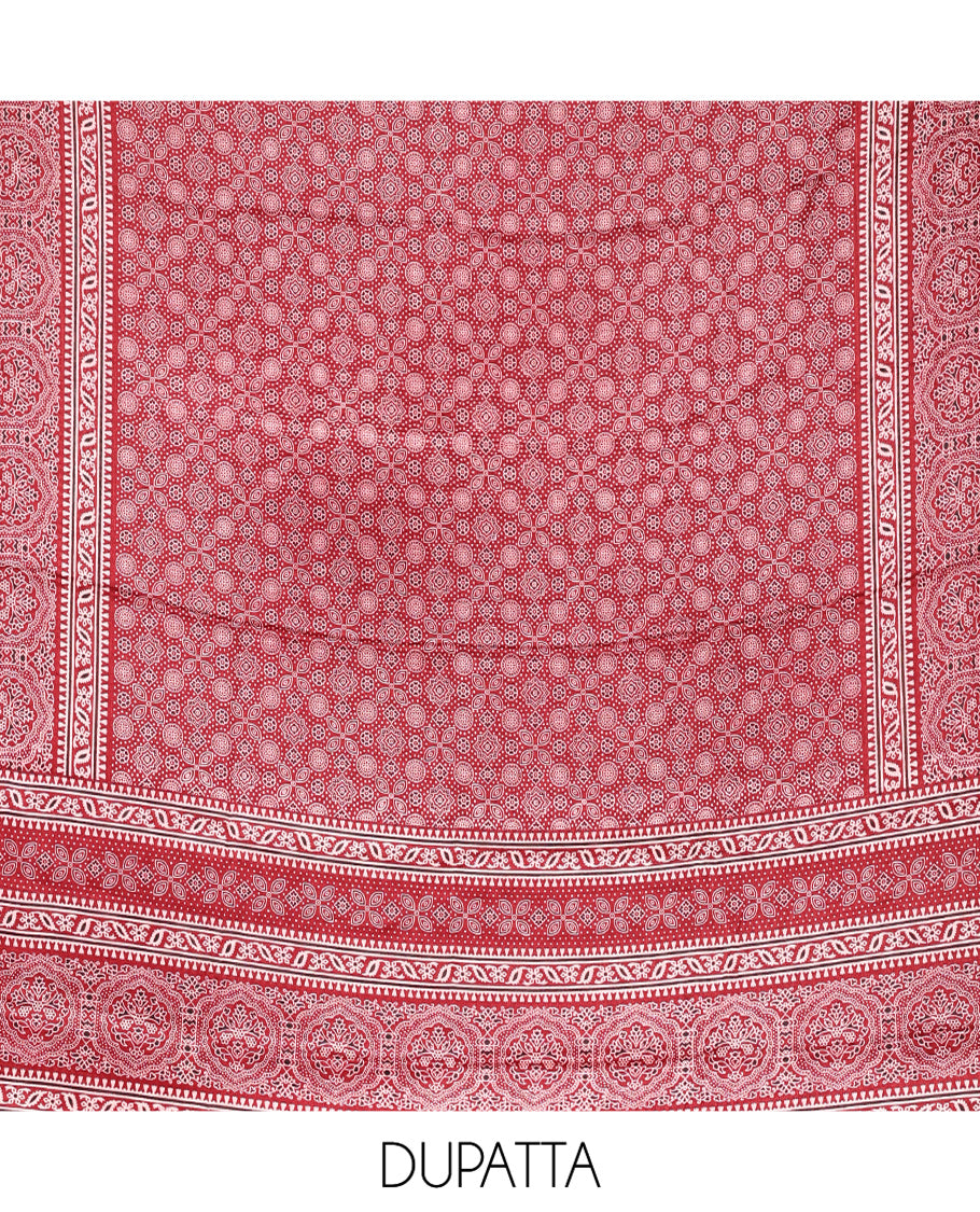 Red Material Chudidhar Set, Bedecked with Ajrakh Patch Work and Mirror Work, Vichitra Silk Top, Plain Santoon Bottom, and Chinon Silk Dupatta Featuring Intricate Ajrakh Prints