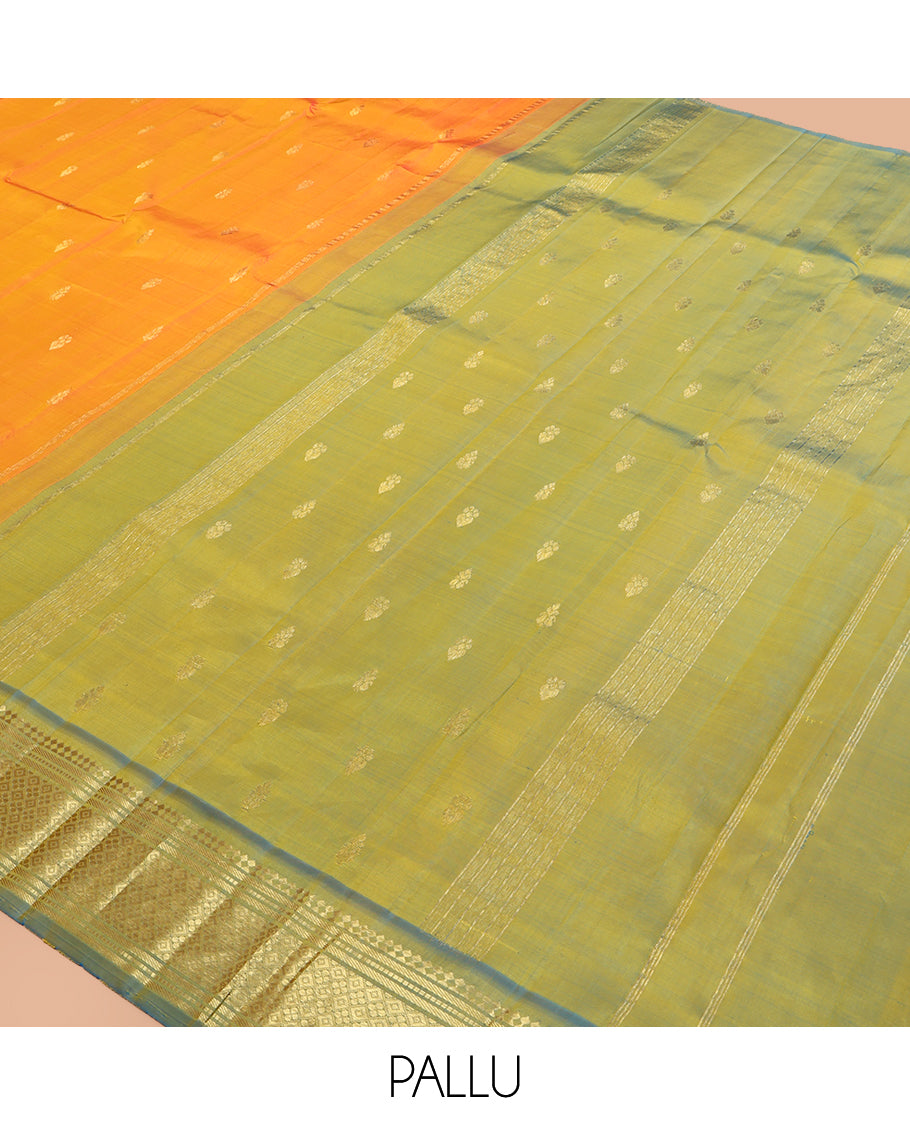 Orange Kanchipuram Silk Saree, Ornamented with Zari Buttas, a Contrast One-Sided Border of Paneer Sombu, Banaras, Muthu, and Jaal Design, Zari Design Pallu, and No Blouse