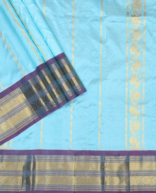 Blue floral design silk half saree with contrast border of rekku, banaras, poo chakram, zari design blouse & floral design dhavani
