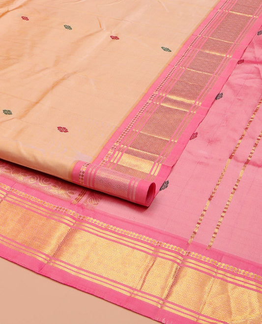 Sandal Kanchipuram Silk Saree, Beautifully Bedecked with Thread Buttas on Its Body, Complemented by a Contrast One-Sided Border of Paneer Sombu, Banaras, and Jaal Designs, Pallu of Floral Designs, and Comes Without a Blouse