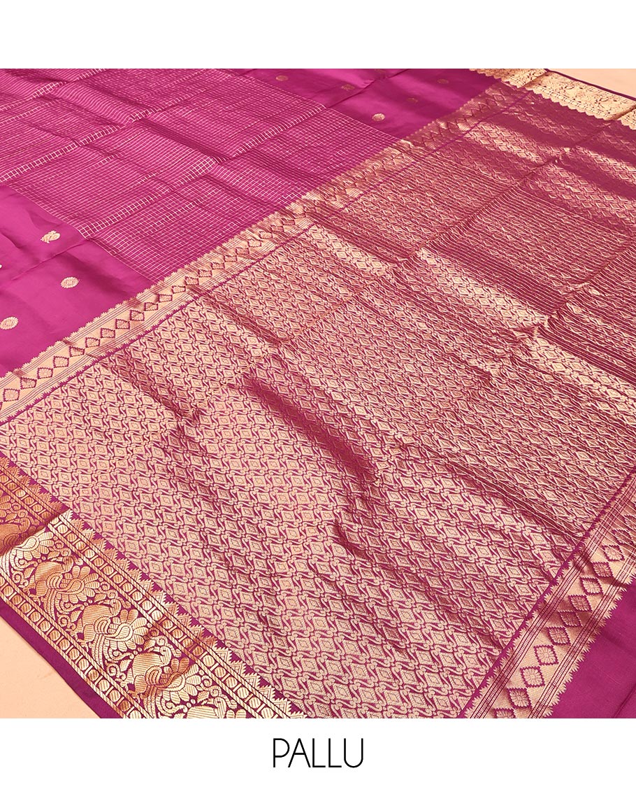 Purple Vasundhara Lite Silk Mix Saree, Artfully Detailed with Mayil-Chakram Buttas and Zari Checks All Over Its Body, Highlighted by a Zari Border of Thazampoo Rekkum, Paisa, Mayil, and Chakram Designs, a Grand Pallu, and Paired with a Matching Blouse