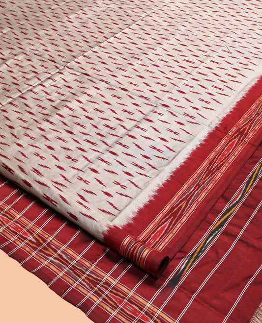 Grey-Red Pochampally Ikat Silk Saree, Adorned with Ikat Buttas, Complemented by a Contrast Ikat Border, Ikat-Style Pallu, and No Blouse