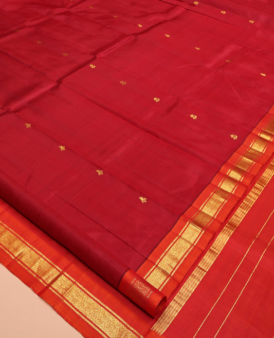 Red Kanchipuram Silk Saree Features Buttas, a Contrast One-Sided Border of Banaras, and Mayil Kann Designs, Zari Design Pallu, and No Blouse