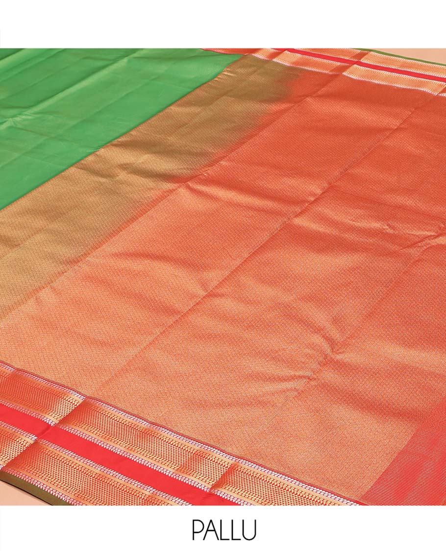 Green Vasundhara Lite Silk Mix Saree, Delicately Woven with Zari Stripes on Its Body, Complemented by a Contrast Rettai Pettu Border of Ara Bogudi, Paisa, Banaras, and Ara Maadam Designs, a Grand Pallu, and Paired with a Contrast Blouse