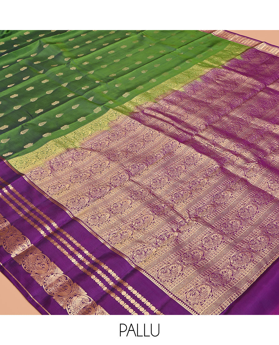 Green Vasundhara Lite-Silk Mix Saree Featuring Zari Buttas, a Contrast Rekku Border of Rudraksham, Round Mayil, and Round Yaali Designs, Grand Pallu, and a Contrast Blouse