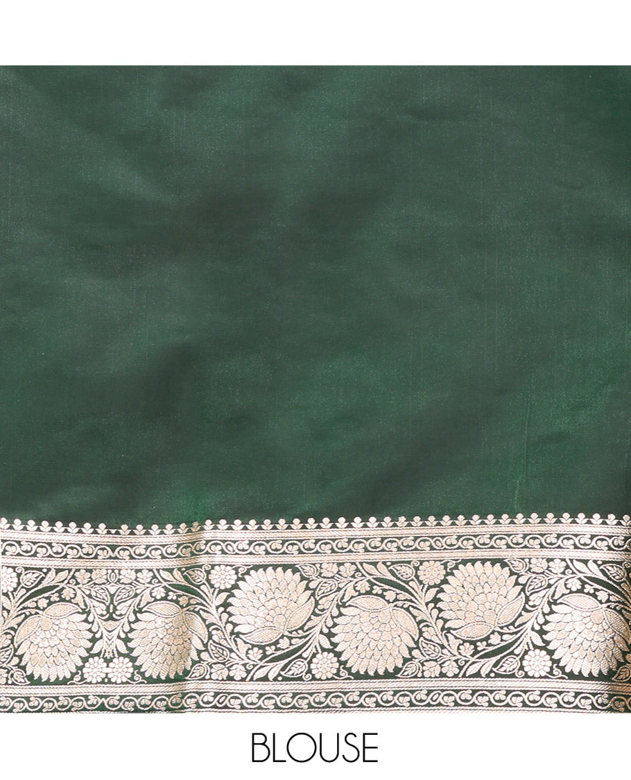 Green Semi-Banaras Saree, Beautifully Bedecked with Jaal Jacquard on Its Body, Highlighted by a Floral Creeper Design Border, Intricately Designed Pallu, and Paired with a Matching Blouse
