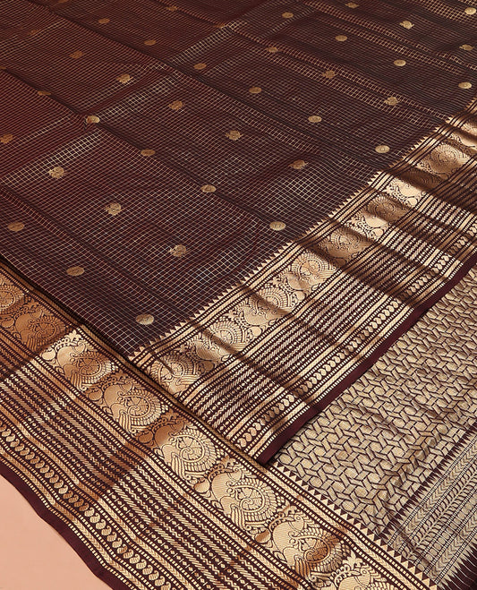 Brown Vasundhara Silk Saree, Masterfully Woven with Zari Buttas and Checks All Over Its Body, Highlighted by  Zari Border of Rekku, Muthu, Kathir, Mayil, Neli, and Manga Designs, Grand Pallu, and Paired with a Contrast Blouse