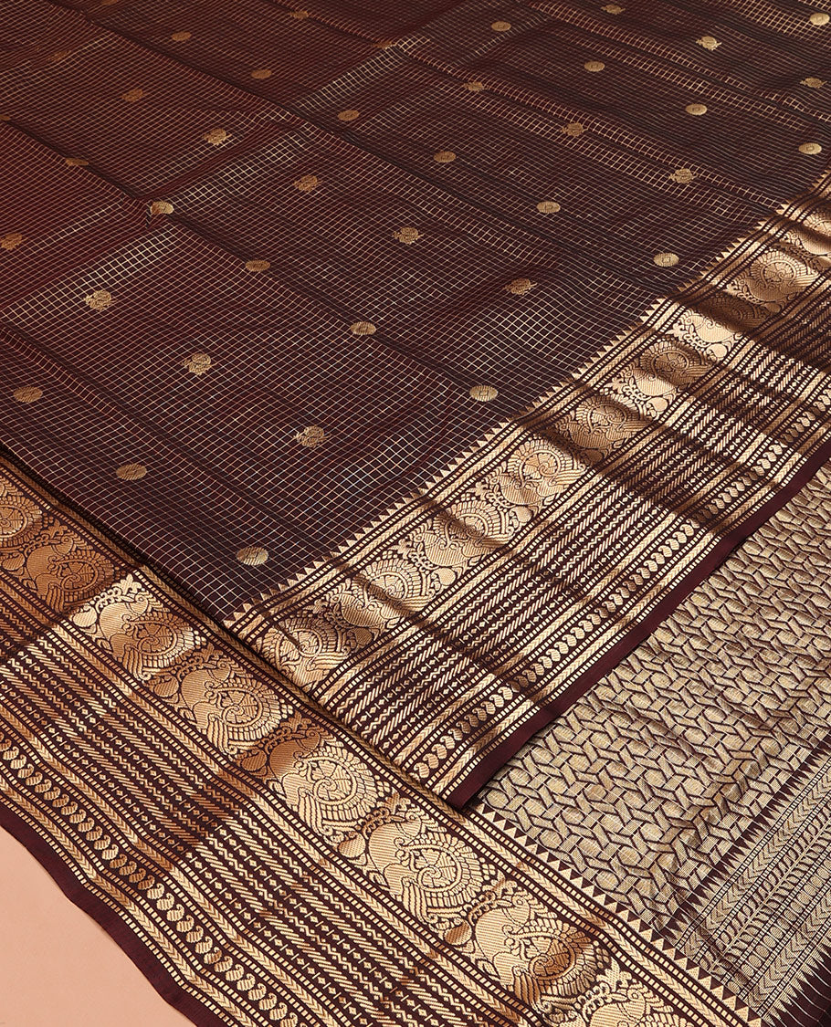 Brown Vasundhara Silk Saree, Masterfully Woven with Zari Buttas and Checks All Over Its Body, Highlighted by  Zari Border of Rekku, Muthu, Kathir, Mayil, Neli, and Manga Designs, Grand Pallu, and Paired with a Contrast Blouse