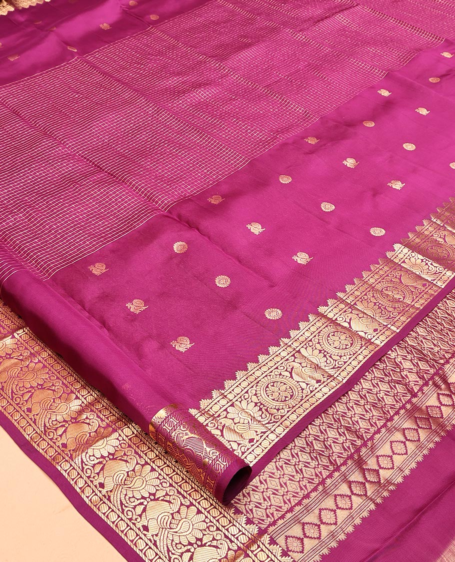 Purple Vasundhara Lite Silk Mix Saree, Artfully Detailed with Mayil-Chakram Buttas and Zari Checks All Over Its Body, Highlighted by a Zari Border of Thazampoo Rekkum, Paisa, Mayil, and Chakram Designs, a Grand Pallu, and Paired with a Matching Blouse