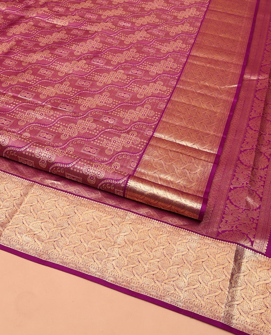 Purple Kanchipuram Wedding Silk Saree, Majestically Detailed with Jacquard Designs on Its Body, Highlighted by a Zari Border of Geometric Designs, Grand Jaal Pallu, and Paired with a Matching Blouse