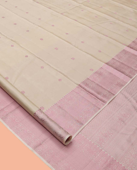 Beige Kanchipuram Silk Saree, Beautifully Bedecked with Thread Buttas, a Self-Border of Thilakam Mokku, Iruthalai Pakshi, and Kuyil Kann, Jaal Pallu, and a Matching Blouse