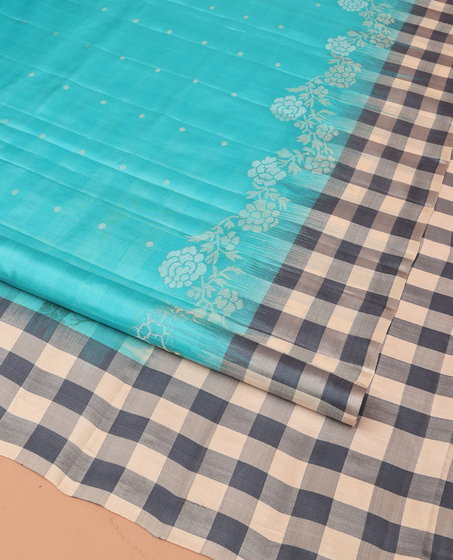 Blue Mayuri Soft Silk Saree, Steeped in Richness with Buttas and Floral Designs on Its Body, Complemented by Contrast Checked Border, Checked Pallu, and Paired with a Contrast Checked Blouse