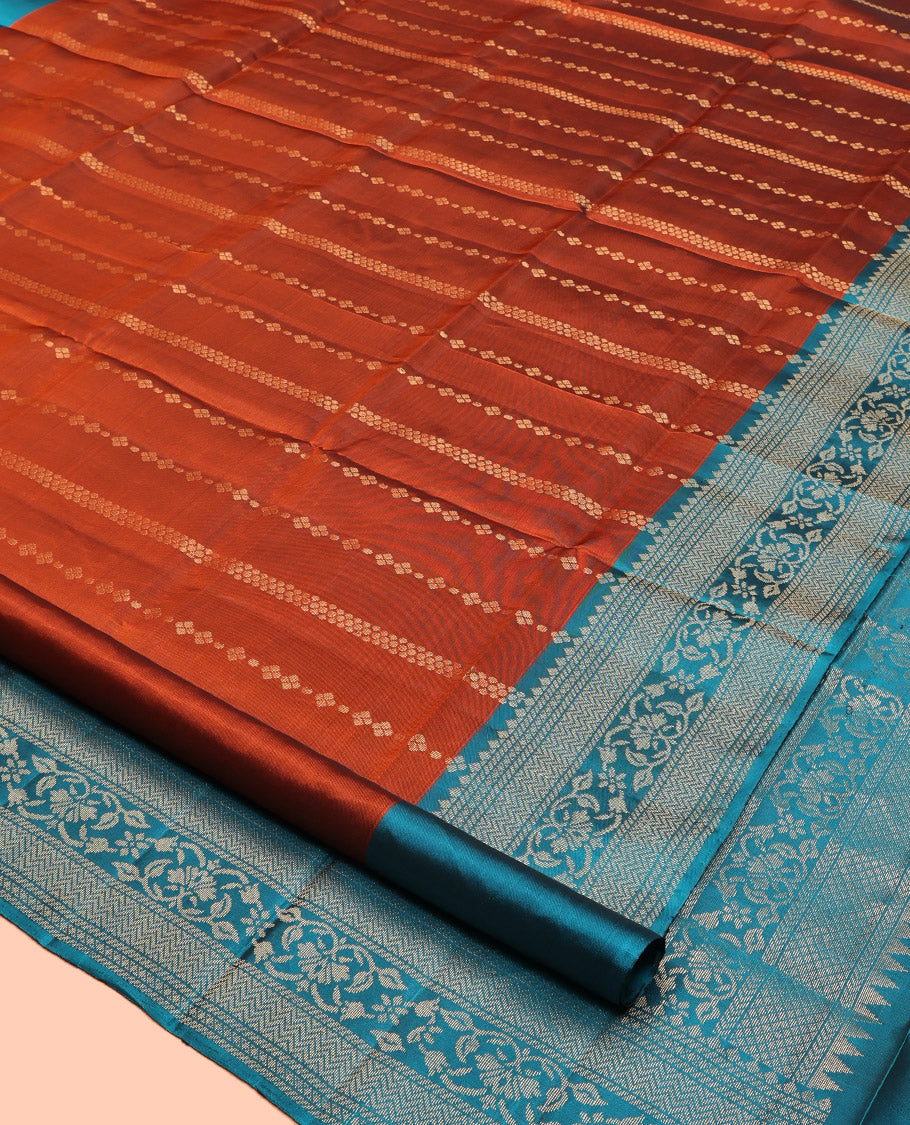 Orange Mayuri Soft Silk Saree, Woven with Zari Designs, Complemented by a Contrast Traditional Border, Pallu of Intricate Design, and Contrast Blouse