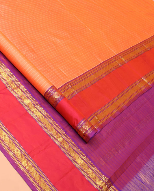 Cantaloupe Orange Kanchipuram Silk Saree with Subtly Woven Vazhaipoo Stripes, Complemented by a Contrast Rettai Pettu Border of Rekku, Muthu, Kathir, and Jaga Nagam Designs, Sparsely Woven Pallu of Zari Designs, and Paired with a Contrast Blouse