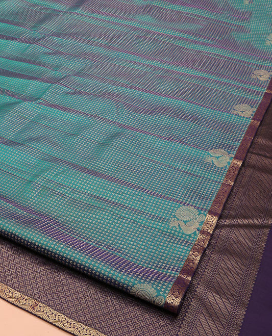 Peacock Blue Vasundhara Lite Silk Mix Saree, Artfully Detailed with Buttas and Mayil Buttas on Its Body, Complemented by a Contrast Piping Zari Border, Grand Jaal Pallu, and Paired with a Contrast Blouse