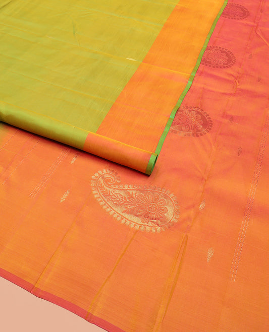 Parrot Green Kanchipuram Silk Saree, Beautifully Designed with Zari Buttas, Complemented by a Contrast Border of Floral Zari Designs, Pallu Adorned with Manga Designs, and Paired with a Contrast Blouse