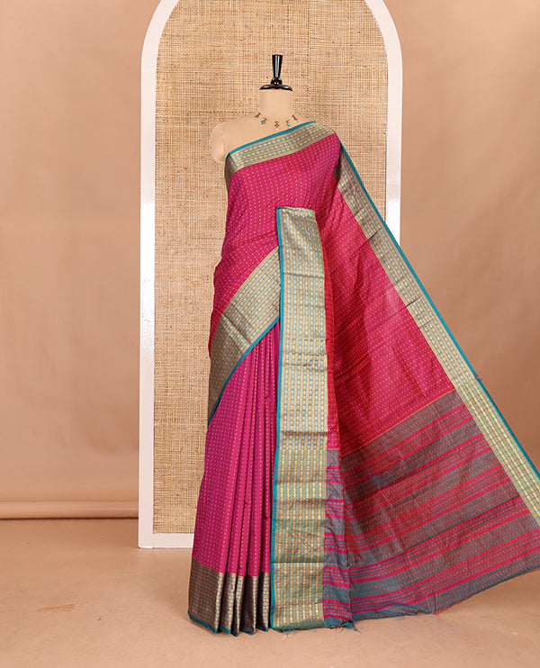 Rani pink thread butta all over body semi soft silk , contrast traditional border , contrast lining chit pallu