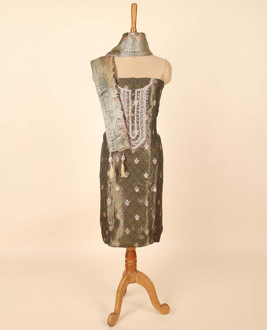 Green material chudidhar set, jaal design & embroidered top, plain bottom & intricate print & zari work dupatta