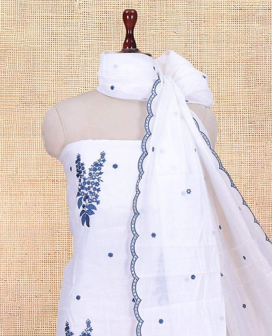 White-Blue Mul Chanderi Material Churidar Features Floral Embroidered Top, a Matching Bottom, and an Embroidered Scallop Dupatta