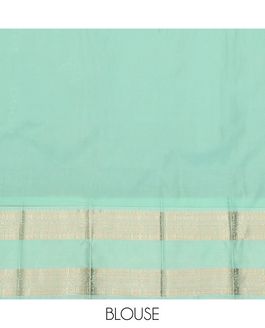 Green Budget Silk Saree, Ornamented With Zari Buttas All Over Its Body, Complemented by Contrast Rettai Pettu Border of Traditional Zari Designs, Sparsely Woven Pallu, and Paired with a Contrast Blouse