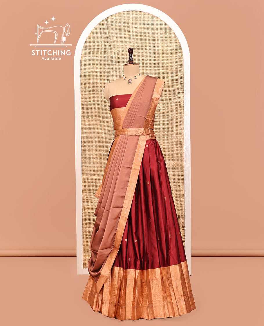 Light Maroon Art Silk Half Saree Features Buttas Skirt, Complemented by Contrast Traditional Border, Matching Blouse, and a Plain Zari-Bordered Dhavani