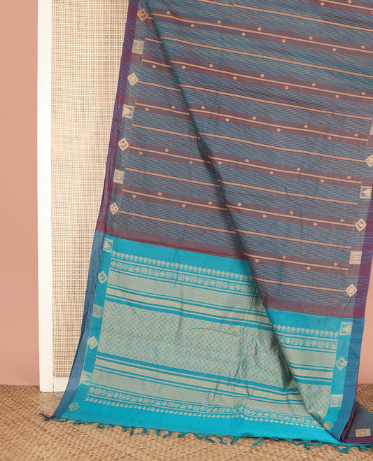 Maroon Coimbatore Cotton Saree, Richly Detailed with Traditional Stripes All Over Its Body, Subtly Bordered with Geometric Patterns, Complemented by Pallu of Jaal Designs, and Paired with a Contrast Blouse