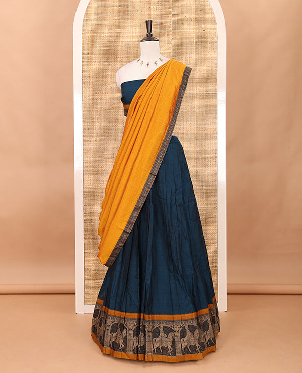 Blue with mustard mercedised cotton half-saree, contrast elephant zari border skirt, matching blouse & one side border georgette dhavani