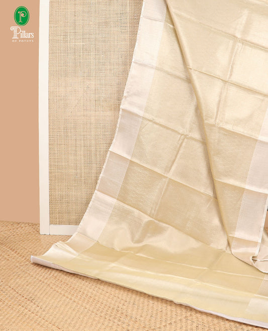 Gold with cream all-over brocade zari weaving design banaras kora tissue saree with contrast zari jacquard border & rich pallu along with brocade blouse
