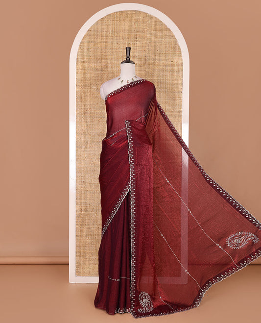 Maroon micro stonework Fendi chiffon saree, scallop micro stonework border, stonework paisley pallu, and matching micro stone work blouse