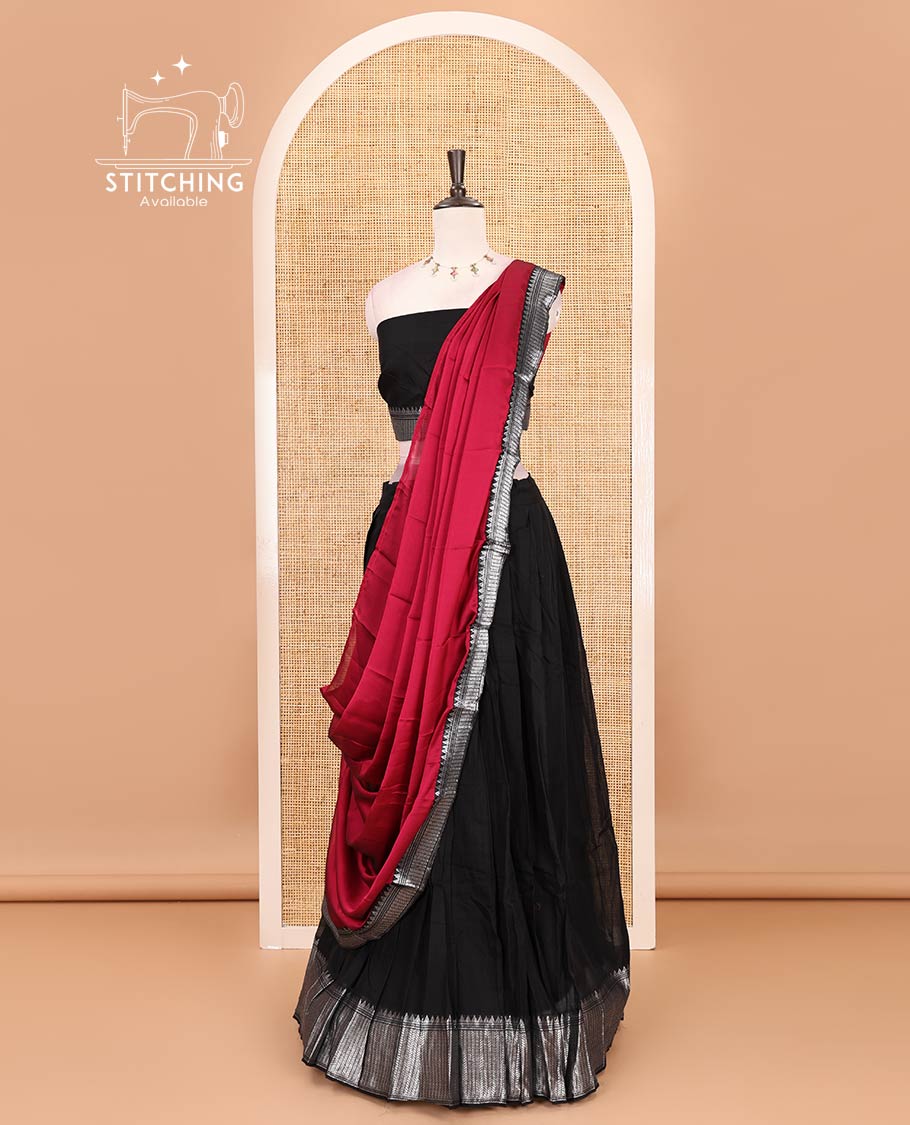 Black-magenta Mercerised cotton half-saree, plain & contrast temple geometric border skirt, matching blouse & contrast zari border Vichitra silk dhavani