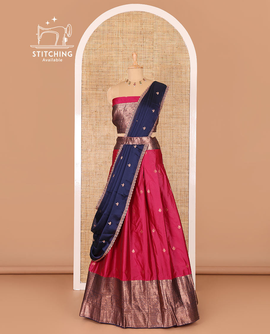 Rani pink taffeta silk half-saree, zari buttas and contrast traditional zari bordered skirt, a matching blouse, and contrast embroidered satin georgette  dhavani