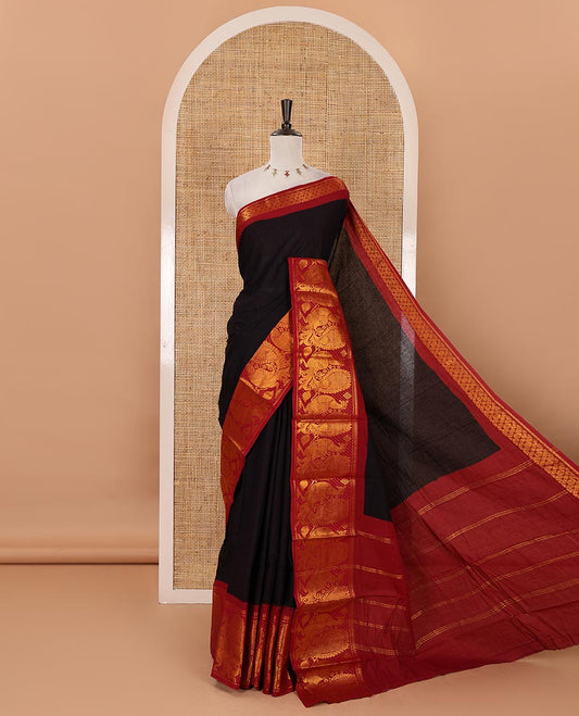 Black plain sungudi cotton saree, contrast big annam motifs woven zari border, zari striped pallu & zari design blouse