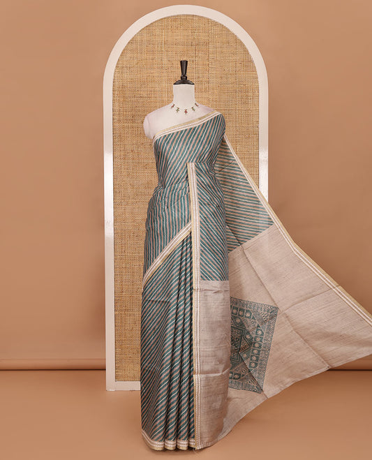 Rama green lehariya-style striped semi-tussar saree, contrast resham thread triangle motifs border, diamond printed pallu & contrast printed blouse
