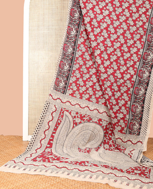 Red floral design machine-printed kalamkari cotton saree with contrast swan design border & animal motifs pallu