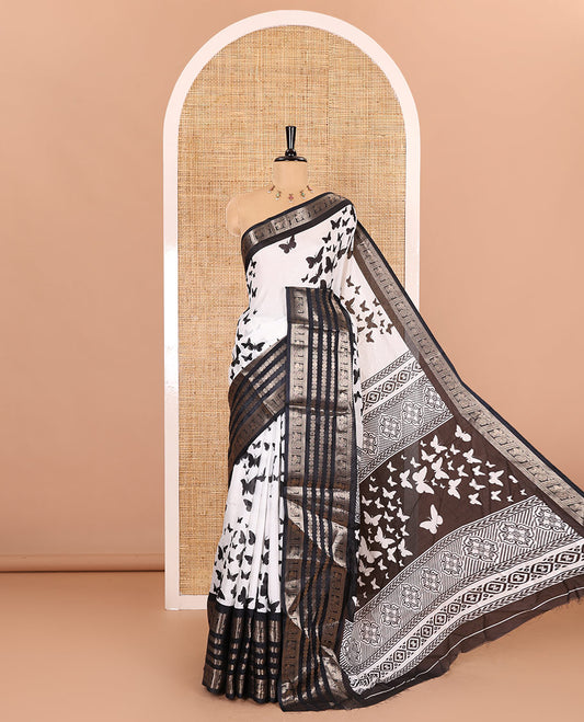 White and black butterflies printed dola silk saree, contrast traditional zari border, printed pallu, and a contrast plain blouse