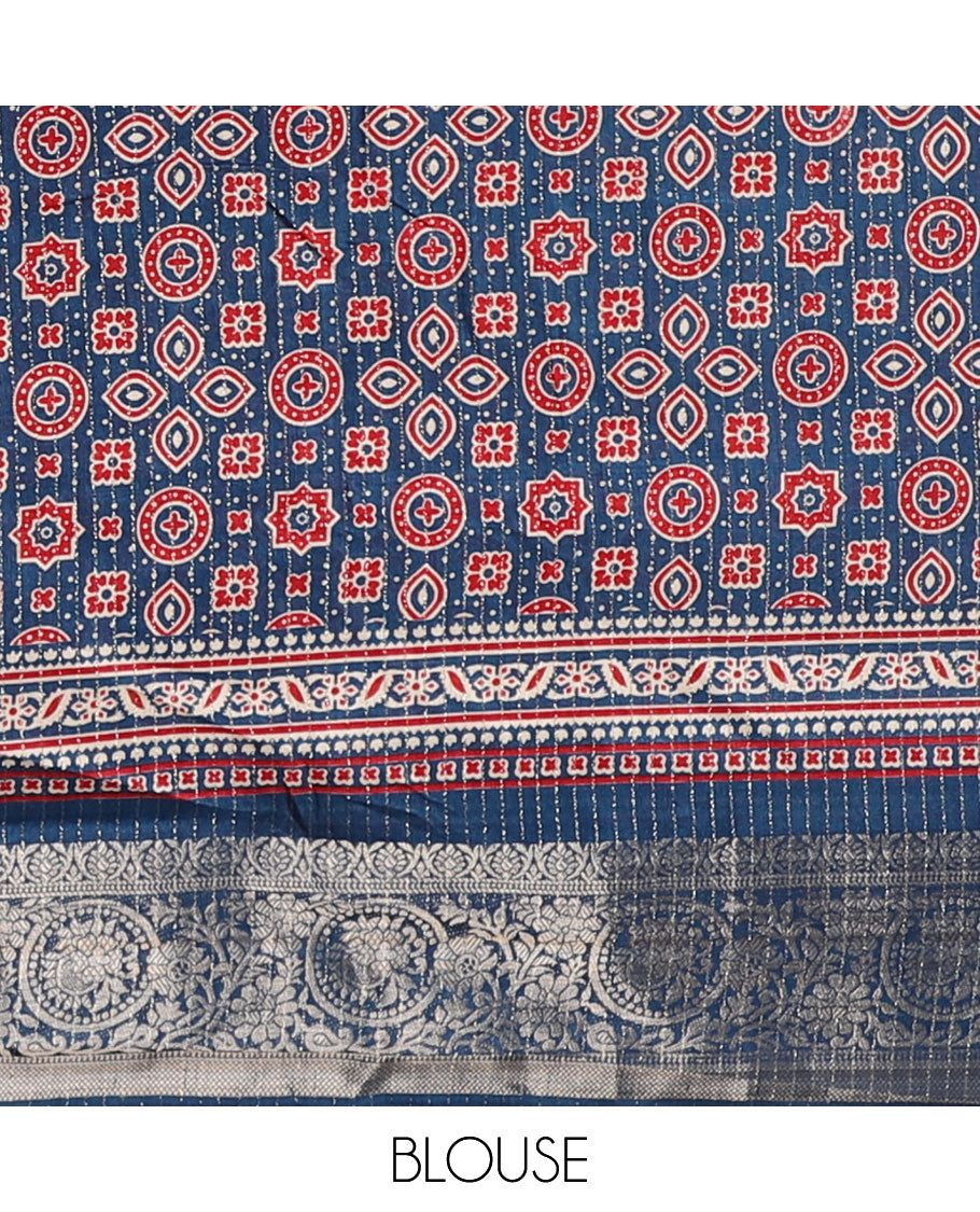 Cream vertical zari striped dola silk saree, contrast blue traditional zari border & intricately Ajrakh printed pallu