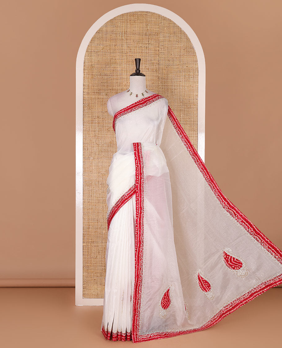 White bandhani mango jhumka patch embroidered crunchy crushed saree, contrast border, and pallu of Swarovski stonework, bandhani dots, and bandhani printed blouse