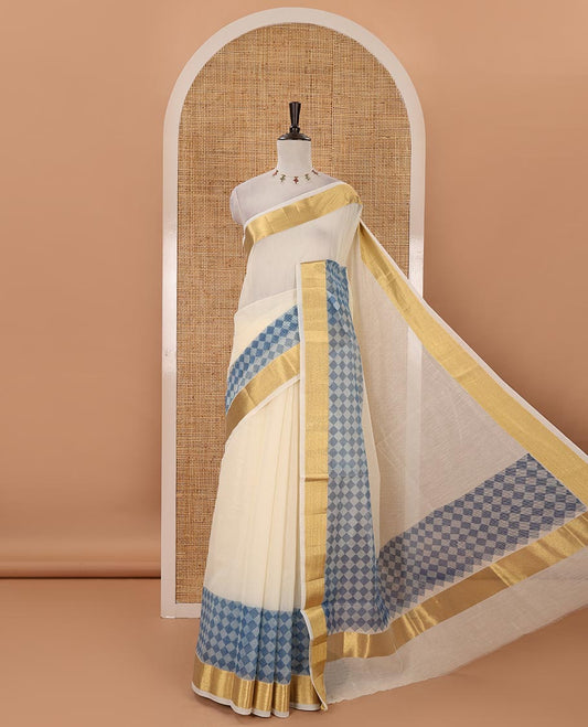 Cream with blue kerala cotton saree , diamond style printed with gold zari tissue bawanchi border & diamond pattern printed pallu with plain blouse