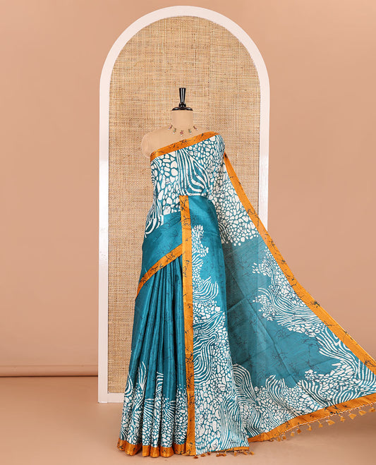 Peacock blue batik printed art Khadi cotton saree, batik printed border, batik printed pallu, and a contrast batik printed blouse