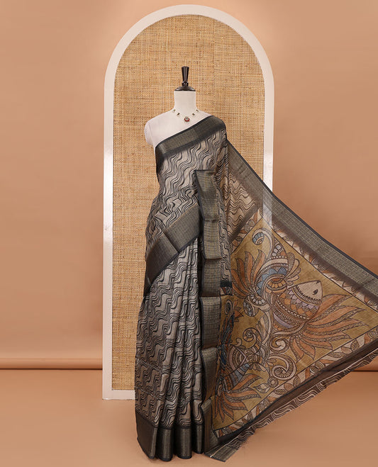 Chikku zig-zag stripes printed semi-jute saree, contrast geometric zari border, Madhubani-style printed pallu, & black blouse of print & zari work