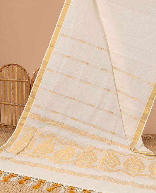 Cream kerala saree with zari designs, zari border & pallu of intricate designs in zari
