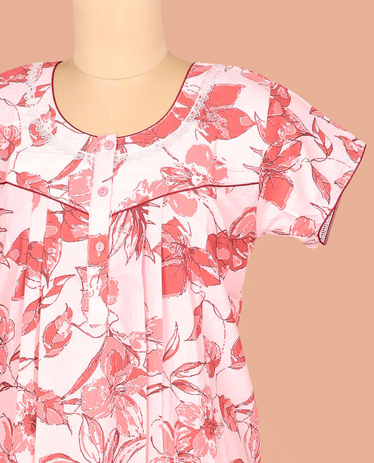 Pale Pink Cotton Nighty Accentuated with Floral Patterns Print, Featuring Lace Work, Round Front Neck, and Half Sleeves