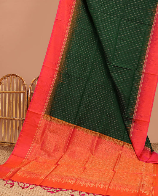 Green soft silk saree with buttas, contrast striped border & pallu of intricate designs