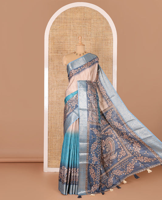 Blue tri-ombre colored zari stripes, and kalamkari peacock printed semi-tussar saree, contrast floral creeper zari border, peacock printed pallu, and a contrast blouse of zari and print work