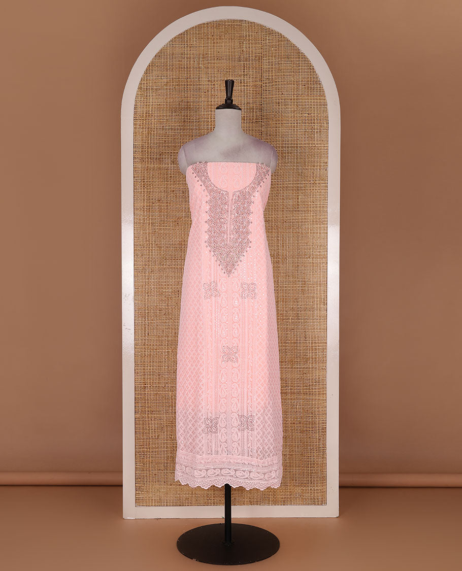 Peach material churidar set, stone work with Schiffli style embroidered georgette top, American Crape bottom, and polka dotted printed mirror work dupatta