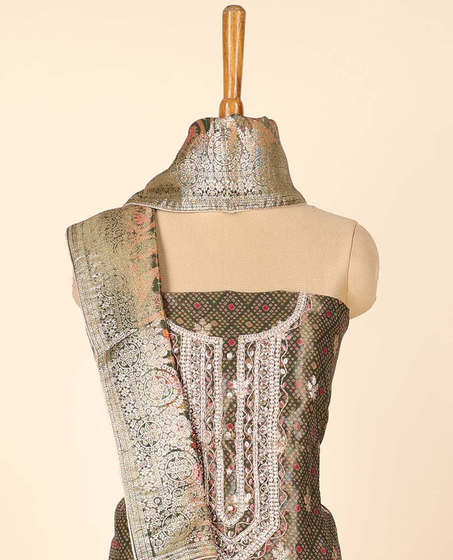 Green material chudidhar set, jaal design & embroidered top, plain bottom & intricate print & zari work dupatta