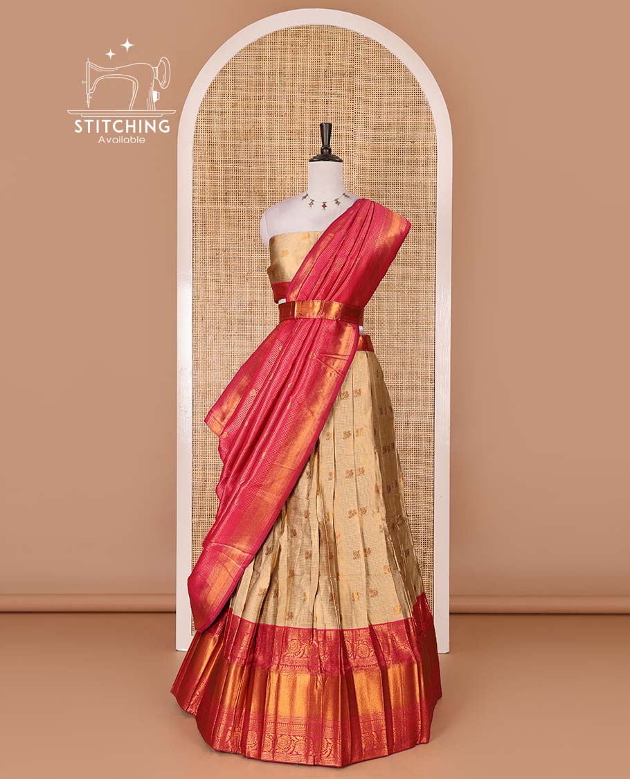 Gold banaras half saree, zari buttas with contrast rani pink traditional zari border skirt, matching blouse, dhavani of zari checks, and buttas