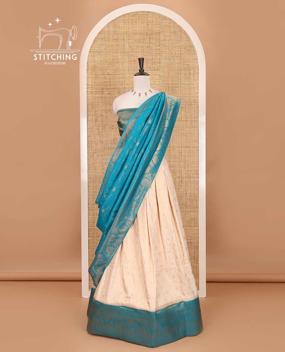 Cream-rama green half-saree, zari jacquard & contrast traditional zari border banaras softy skirt, semi-banaras jacquard blouse & contrast zari design blouse