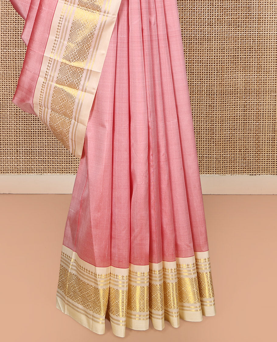 Pink Kanchipuram Silk Saree Featuring Zari Buttas, Complemented by a Contrast One-Sided Border of Panner Sombu, Banaras, and Jaal Design, Zari Design Pallu, and No Blouse