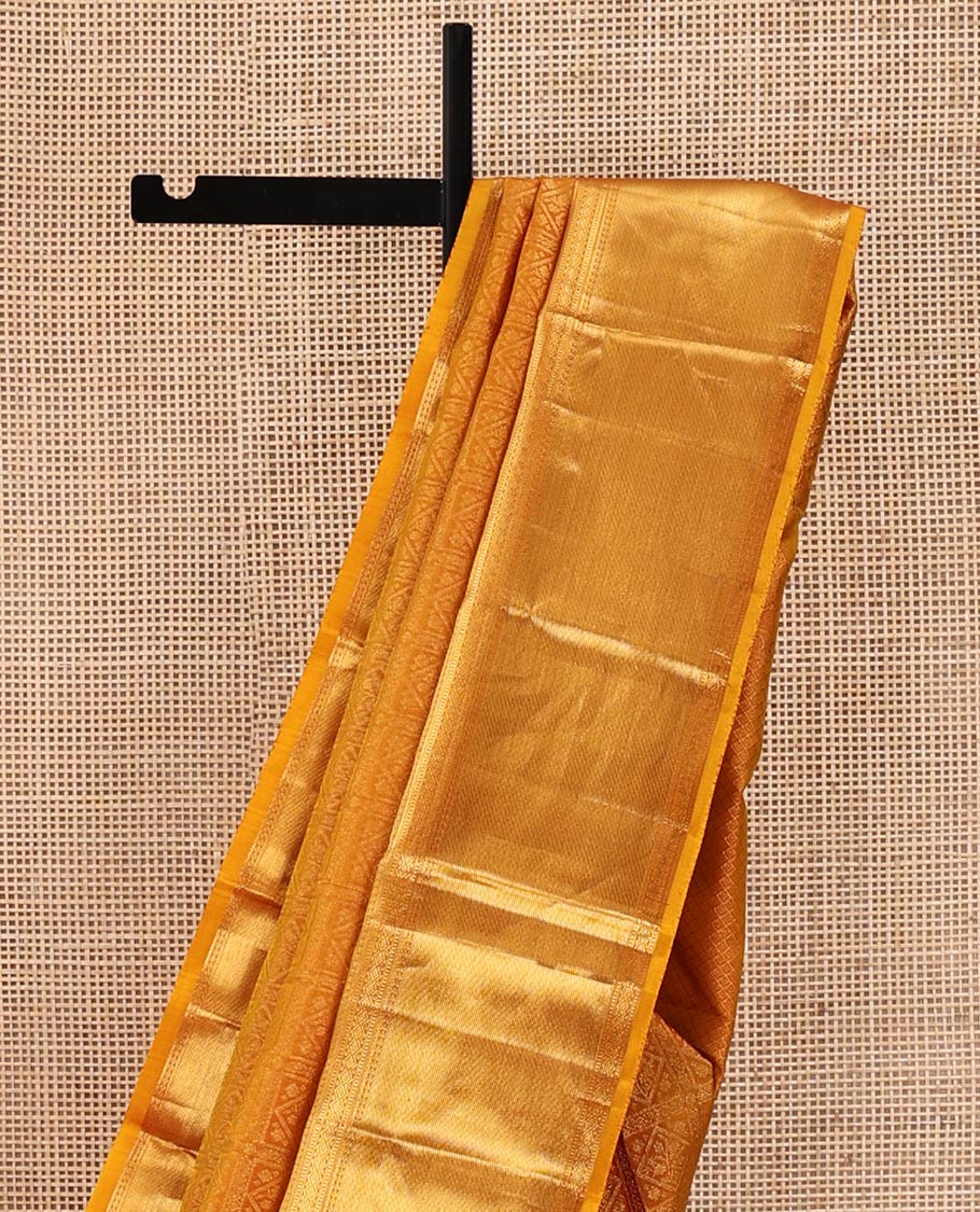 Gold Kanchipuram Wedding Silk Saree, Richly Detailed with Jacquard Design On Its Body, Highlighted by Zari Border of Rekku, Poun, Kodi Visiry, and Diamond Designs, Grand Jaal Pallu and Paired with a Matching Blouse